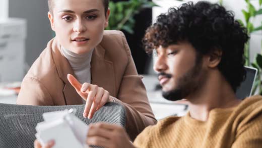 Team members working together at an office place.